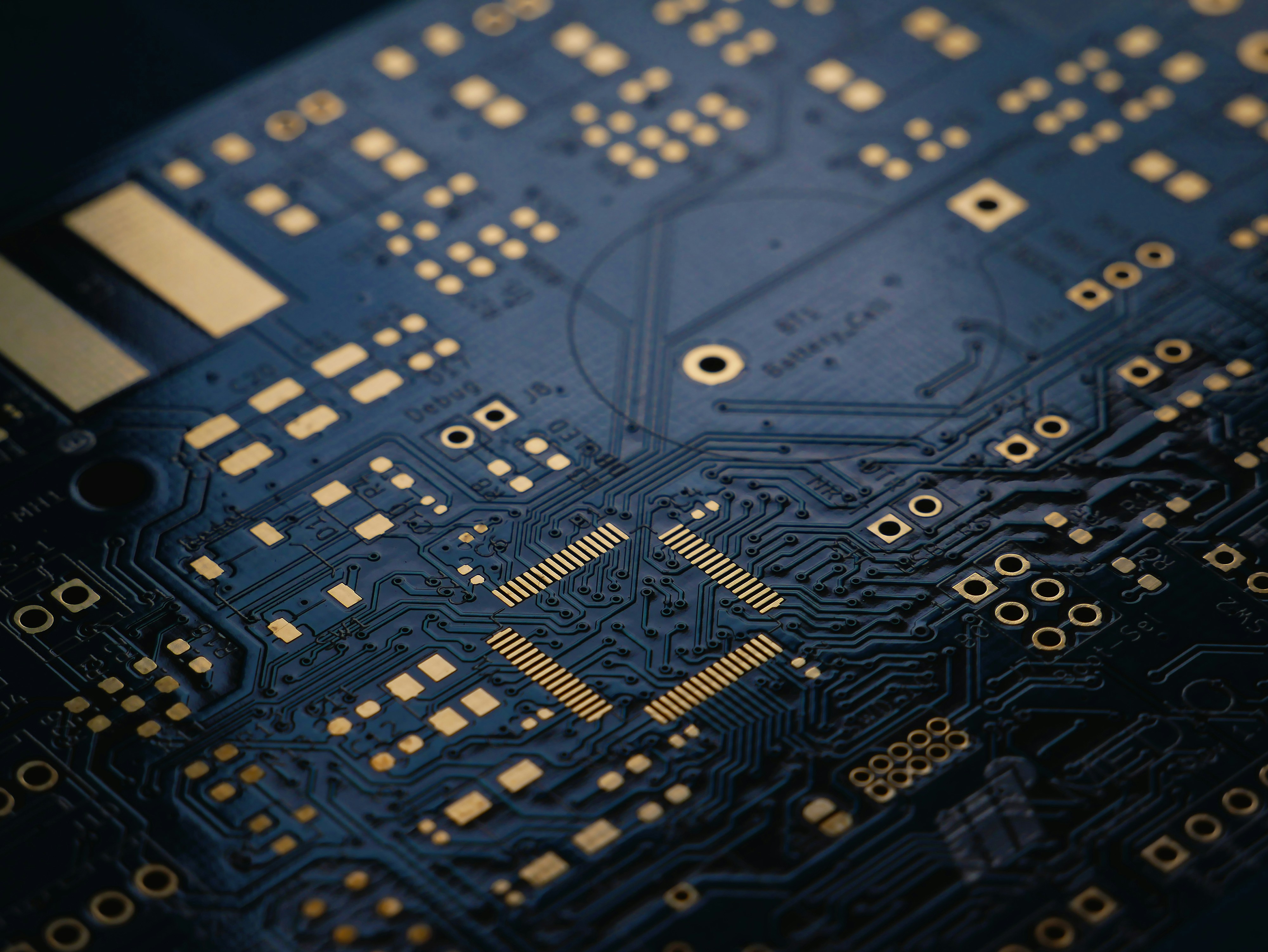 Dark blue PCB with gold traces — Taiwan precision manufacturing